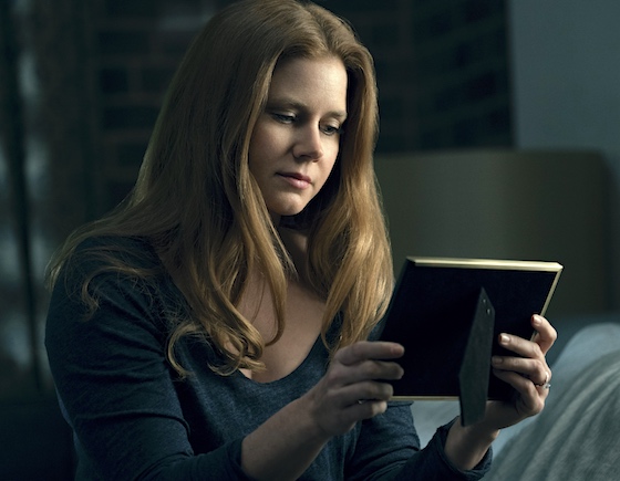 There are no official photos of Superman from this movie, so here's a photo of Lois Lane looking at a photo of Superman